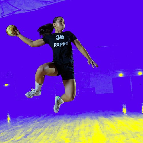 Iceland handball player jumping and throwing